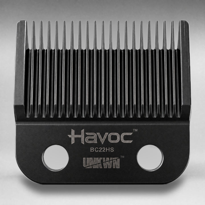 UNKWN Havoc Blade BC22HS, straight-on view showing the cutting teeth, two mounting holes, and Havoc name etched on the face