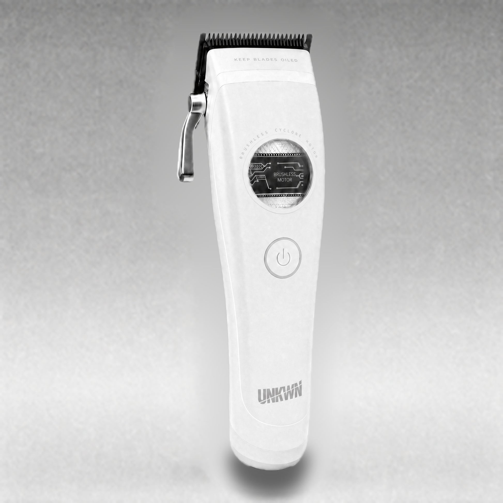 UNKWN Cyclone Clipper UNK1C in white, three-quarter view showing the front face and chrome taper lever