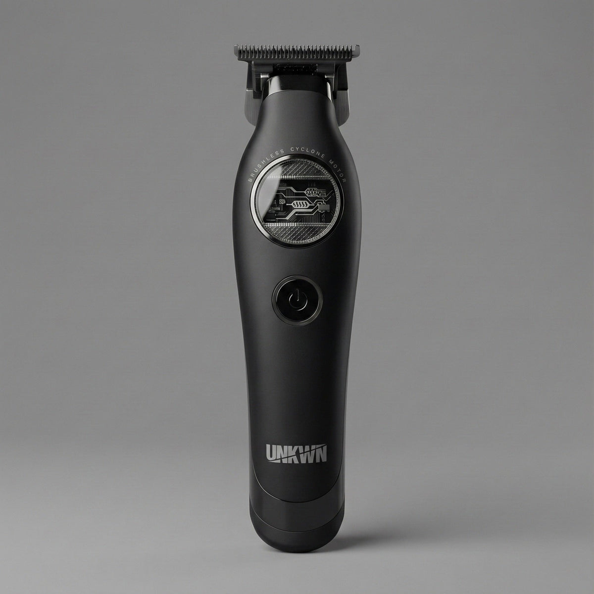 The UNKWN Vortex Cyclone Trimmer UNK1T standing upright, showing the brushless motor window and the power button