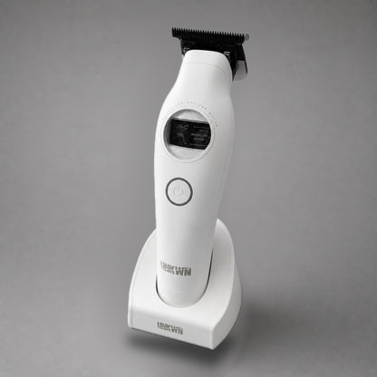 Three-quarter front view of the white UNKWN Vortex Cyclone Trimmer in its charging dock, showing the brushless motor window
