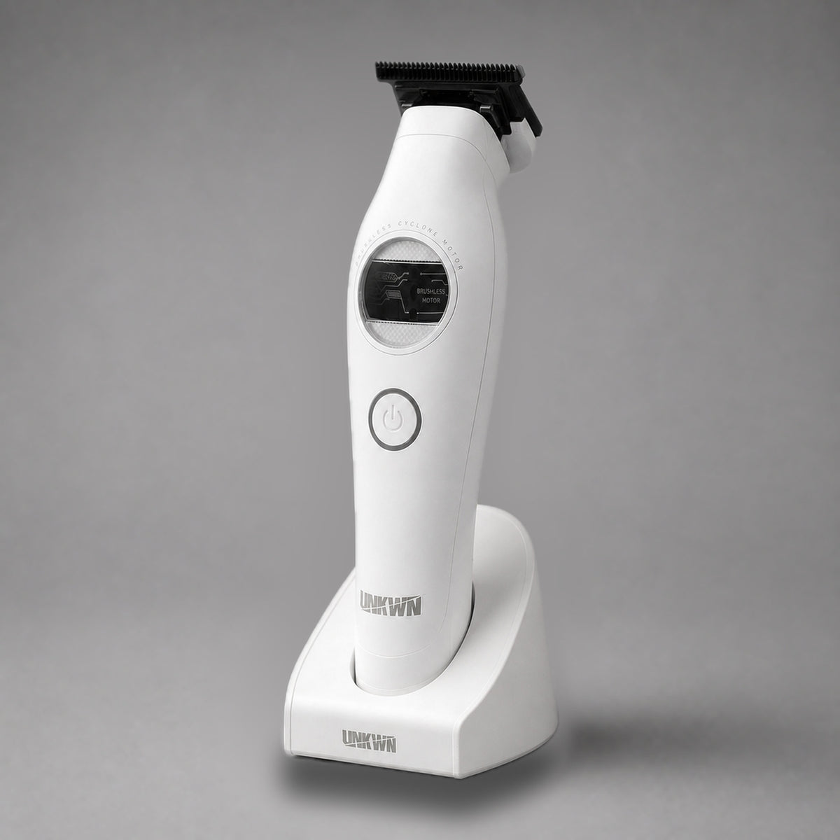 Side view of the white UNKWN Vortex Cyclone Trimmer standing upright in its charging dock